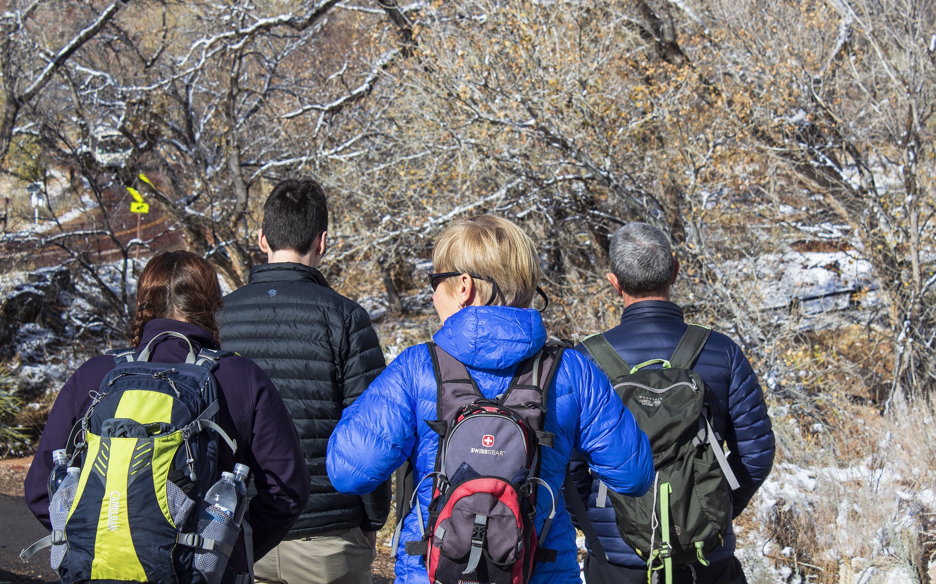 Family Hiking Along A Trail