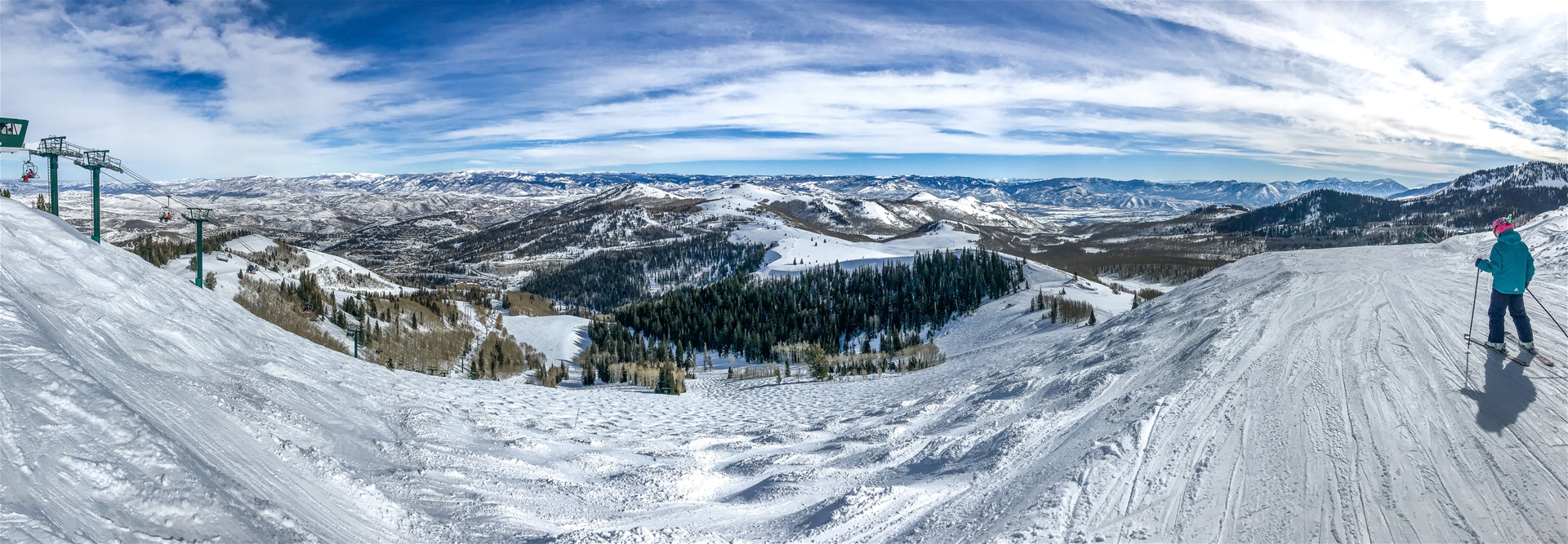 Panoramic view of Wasatch mountains at Deer Valley ski resort from near the top of Empire lift