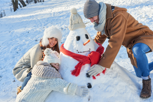 Family Building A Snowman