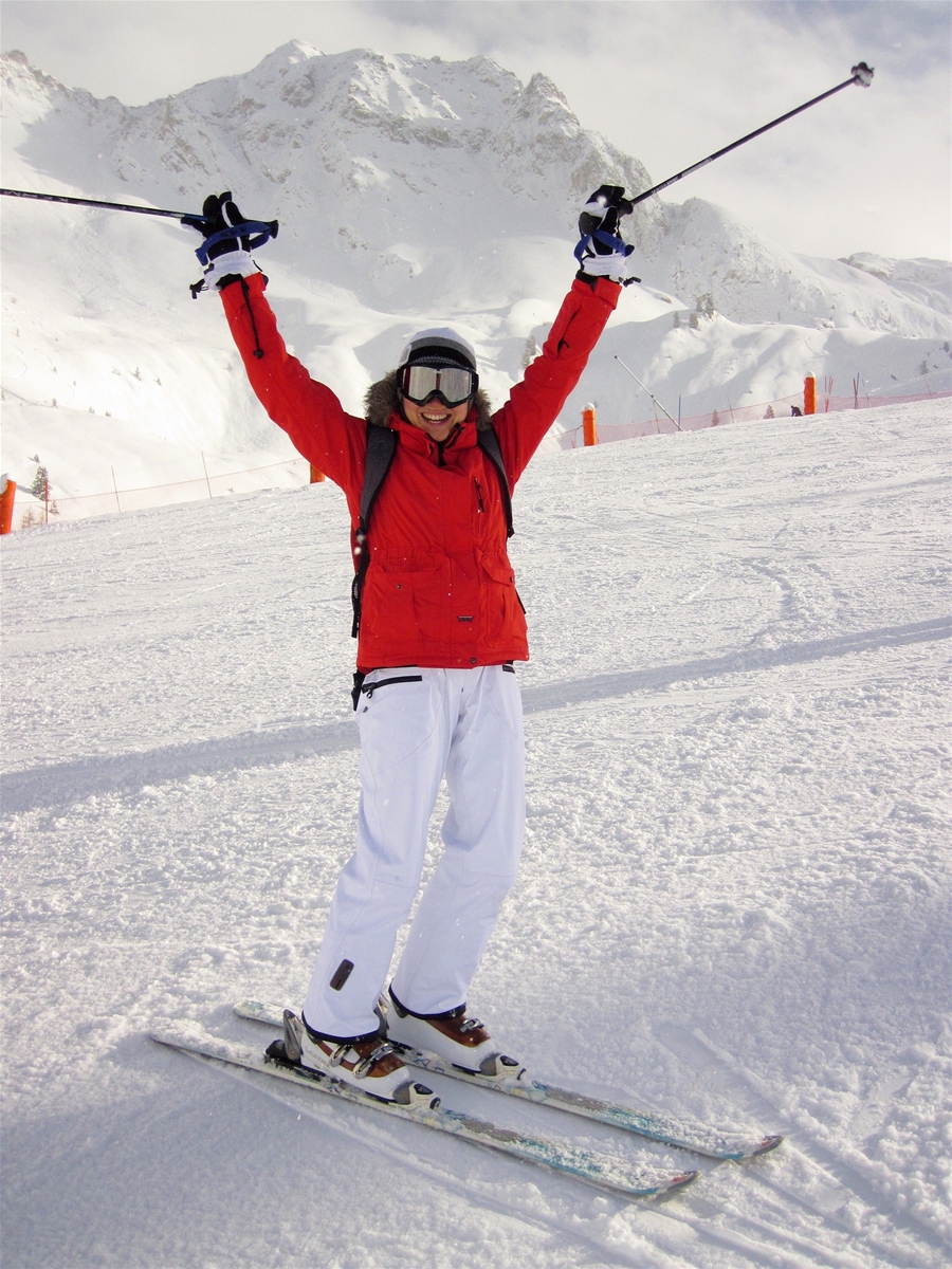 Woman Skiing & Celebrating