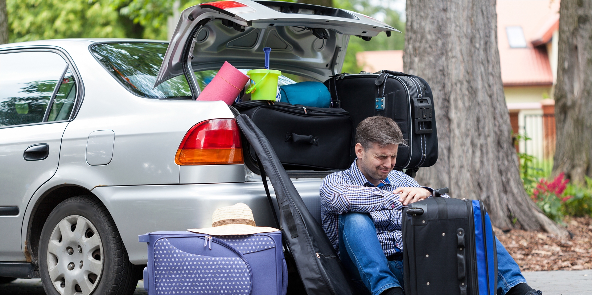 Man Frustrated With Packing Car
