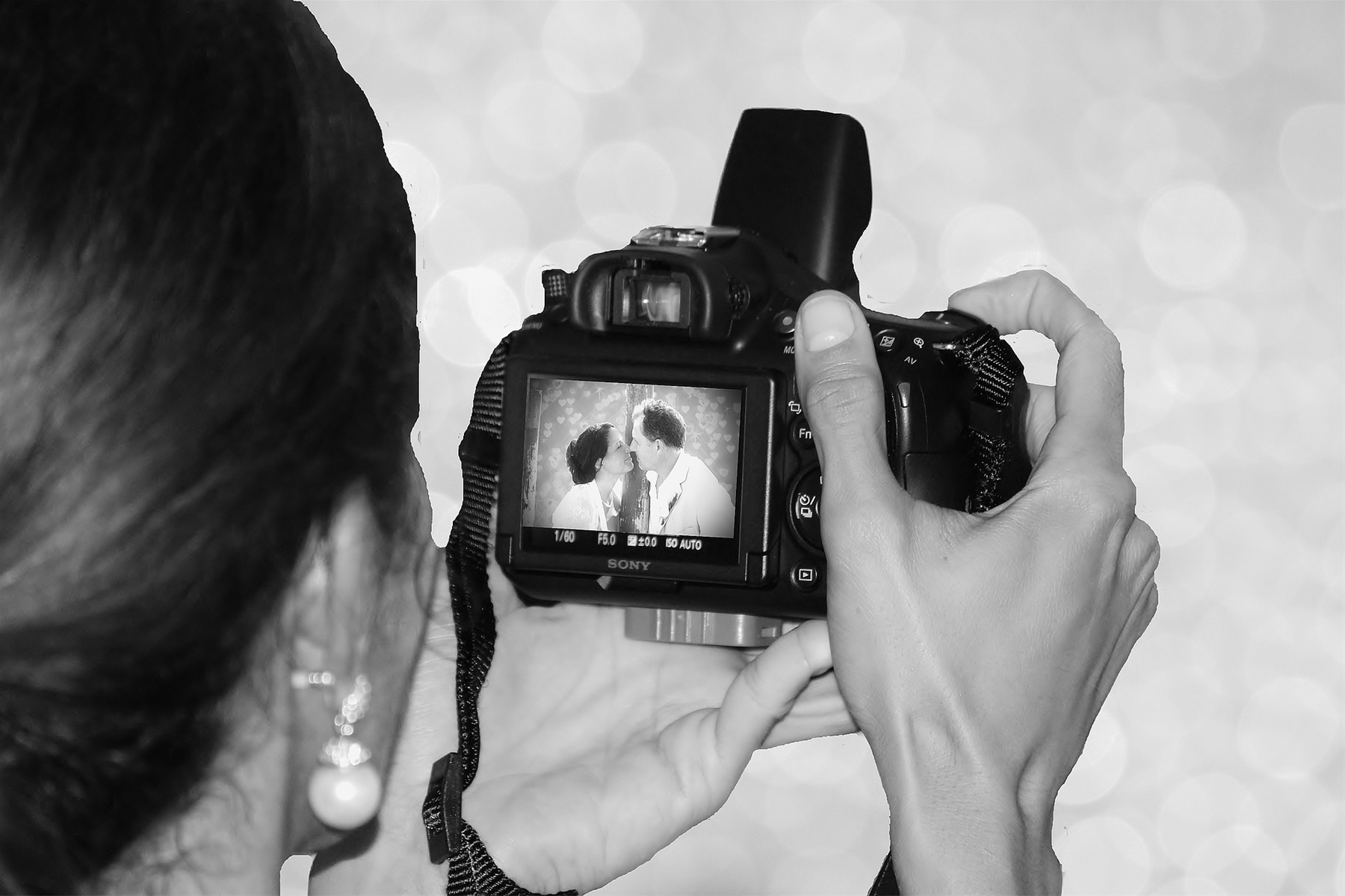 Wedding Photographer Taking Photo of Couple