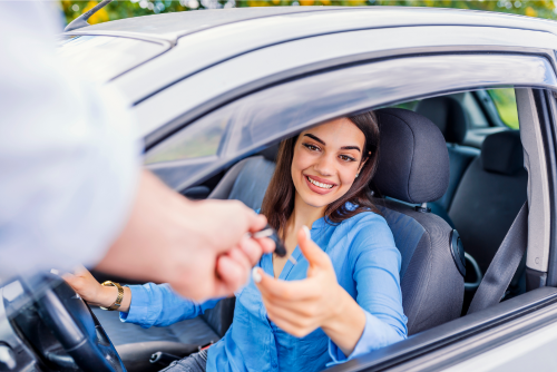 Women Renting A Car and Reciving the Keys